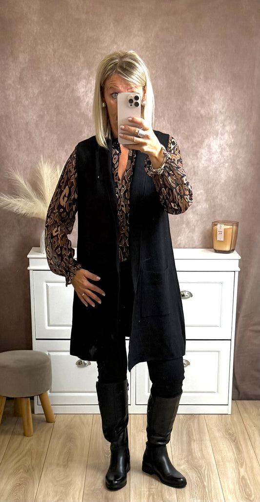 Long gilet sans manches avec poches