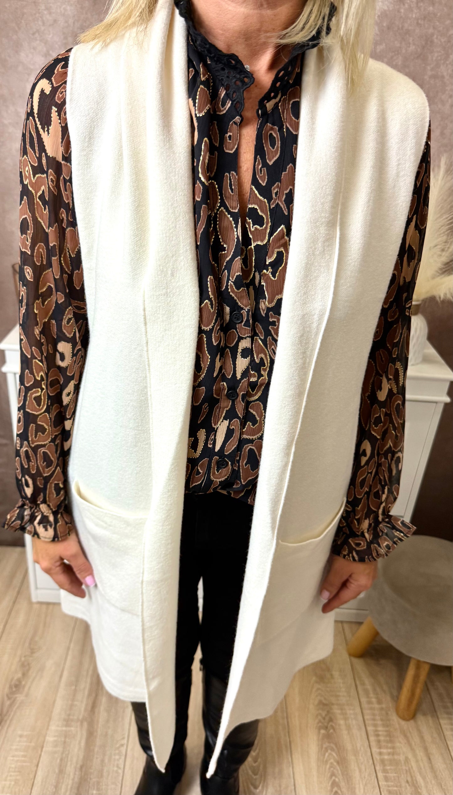 Long gilet sans manches avec poches