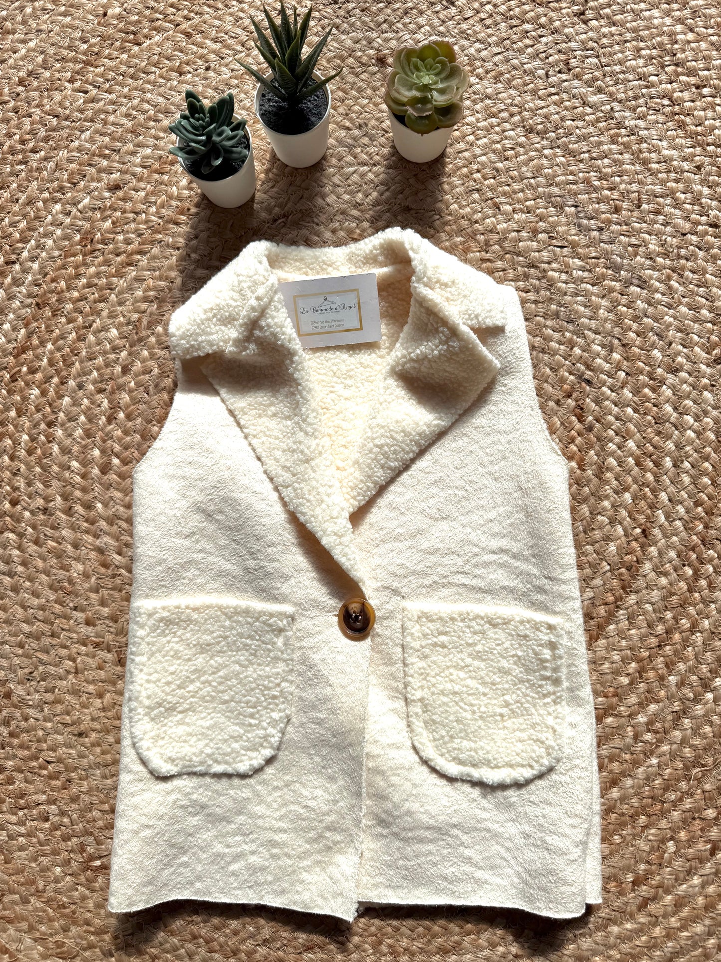 Gilet mi-long avec bouton