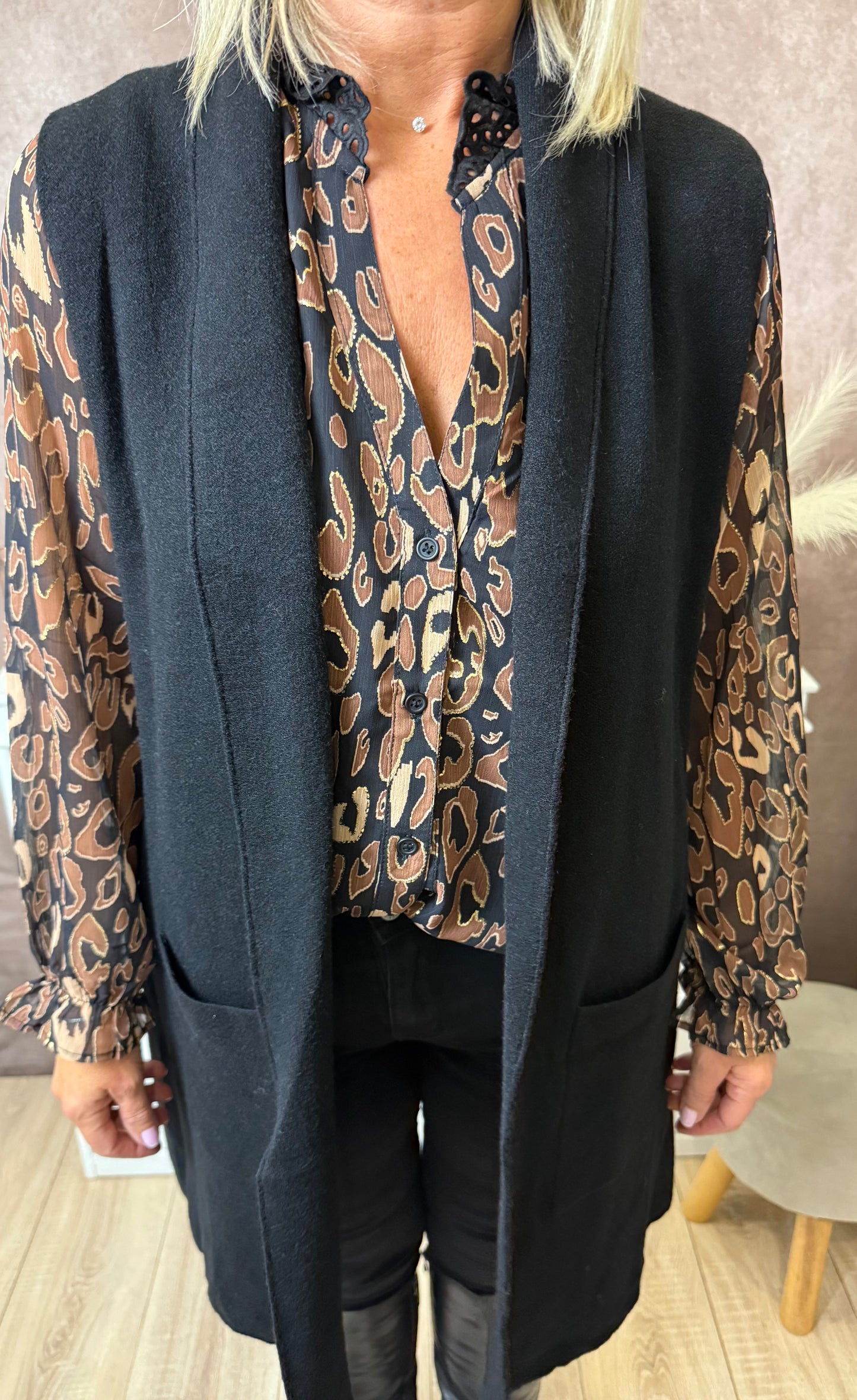 Long gilet sans manches avec poches