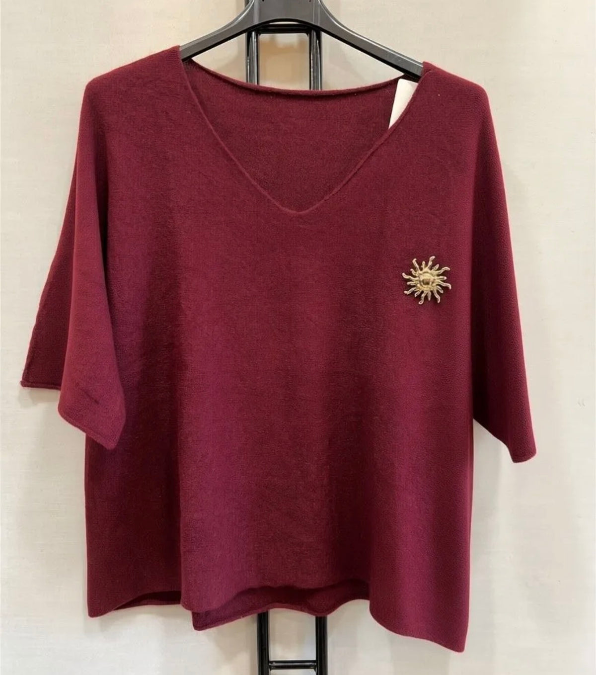 Pull col V avec broche soleil ☀️